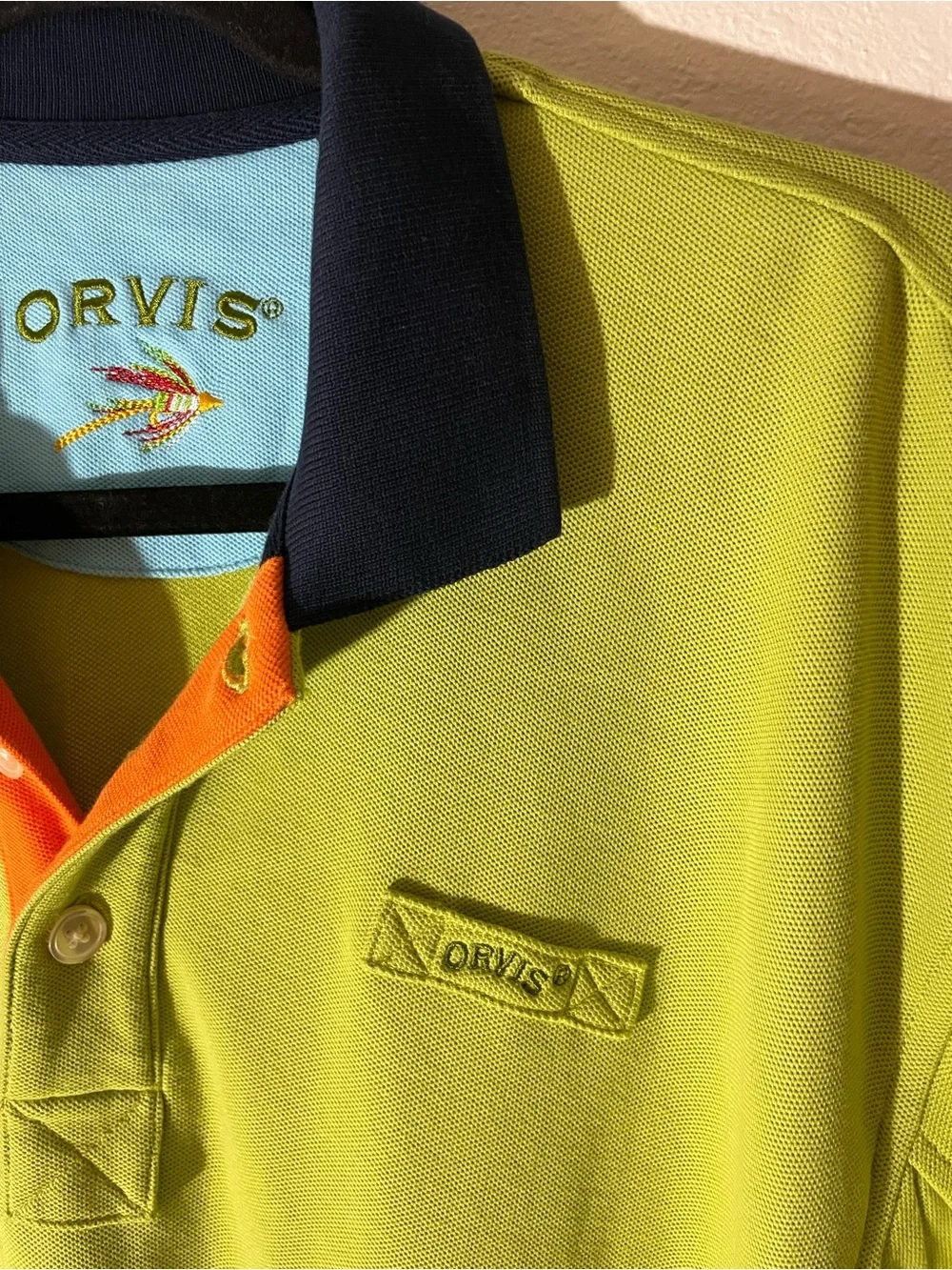 Orvis Lime Green Polo with Navy Collar and Orange Placket Accents